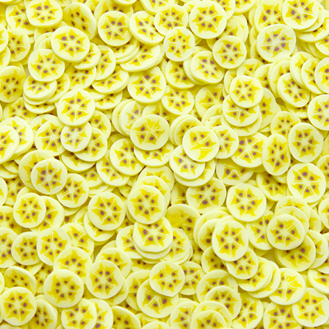 A mix of round yellow banana slice sprinkles