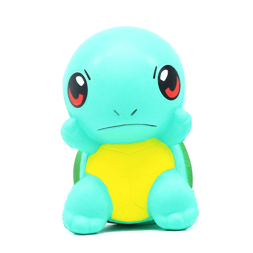 A mint coloured squishy with the shape of a tortoise, has a yellow belly and and angry expression in its face.