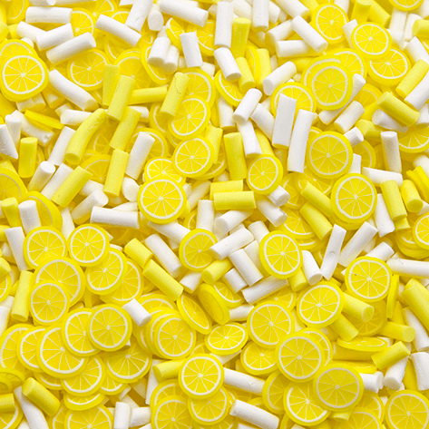 A mix of yellow lemon slice sprinkles with white sprinkles
