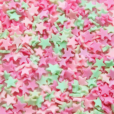 A mix of pastel coloured star sprinkles