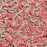 A mix of red triangle shaped watermelon slices sprinkles