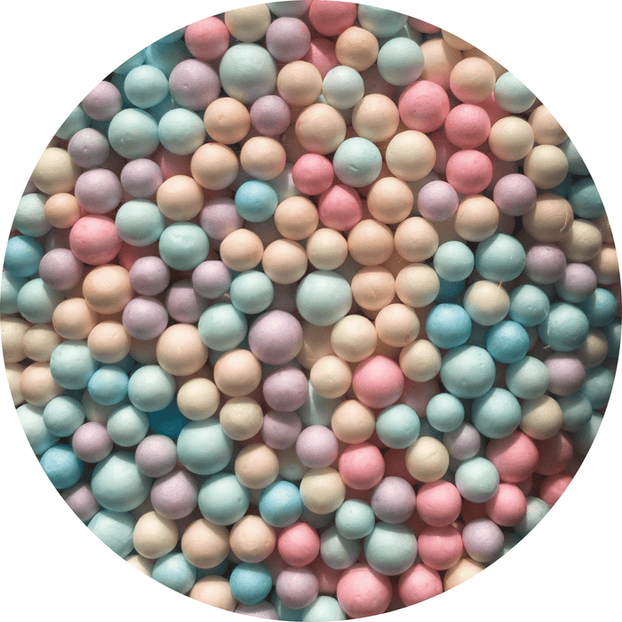 A mix of multicoloured pastel foam beads
