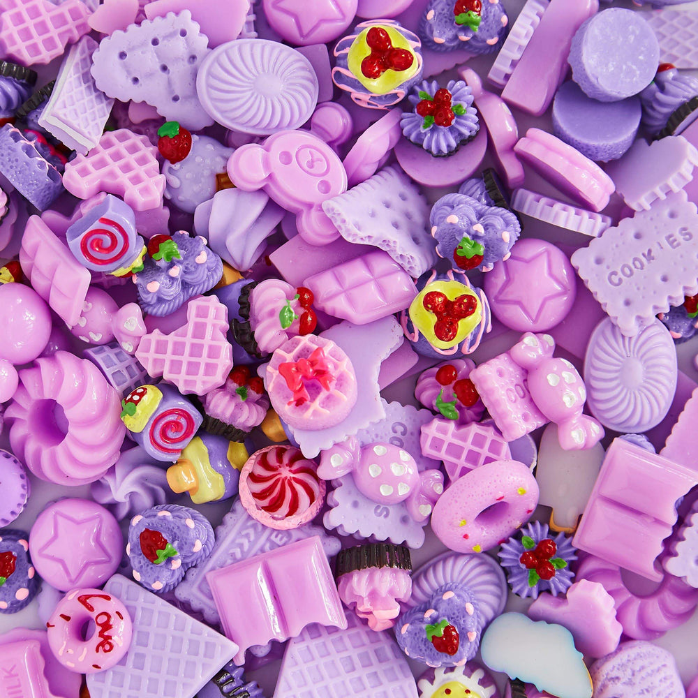A mix of multi-shaped purple charms 