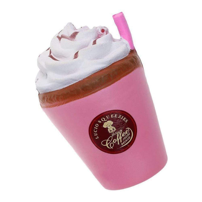 A pink frappuccino squishy with a pink straw and white icing
