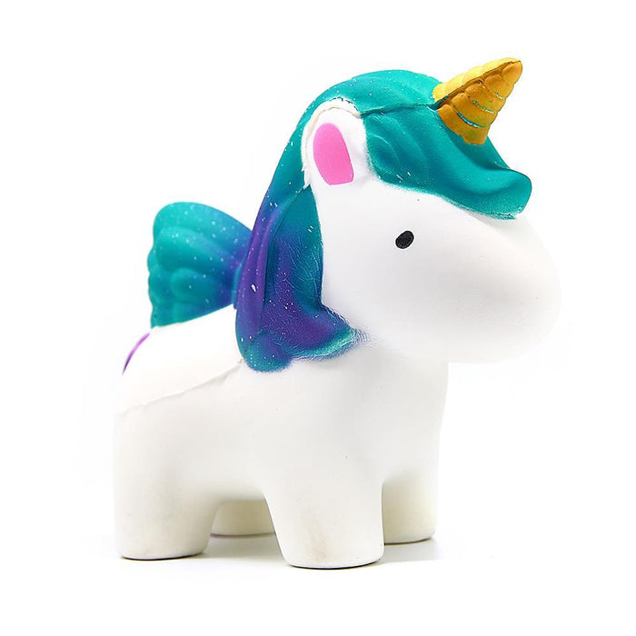 A white unicorn squishy with a golden horn and gradient turquoise to purple hair. 